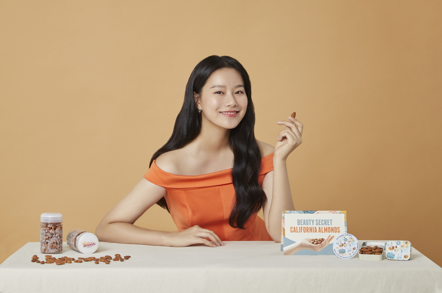 new beauty mentor Youna Park with almond consumer collateral